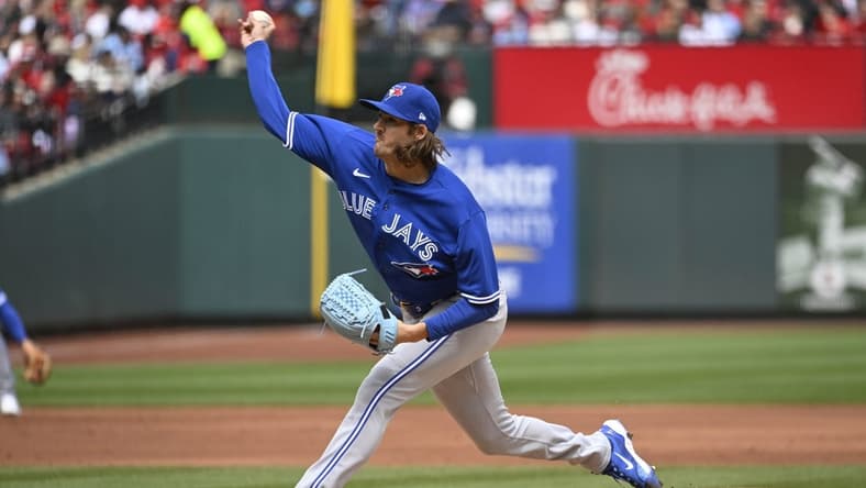 Apr 1, 2023; St. Louis, Missouri, USA; Toronto Blue Jays starting pitcher Kevin Gausman (34) pitches against the St. Louis Cardinals in the first inning at Busch Stadium. Mandatory Credit: Joe Puetz-USA TODAY Sports