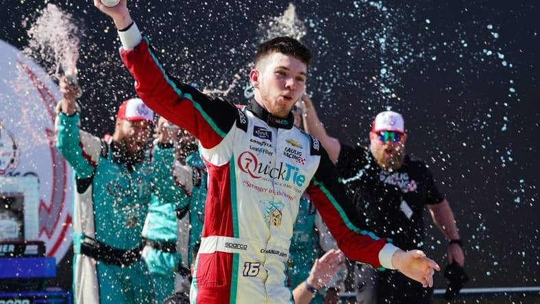 Apr 1, 2023; Richmond, Virginia, USA; Xfinity Series driver Chandler Smith (16) celebrates in victory lane after his win in the ToyotaCare 250 at Richmond Raceway. Mandatory Credit: John David Mercer-USA TODAY Sports
