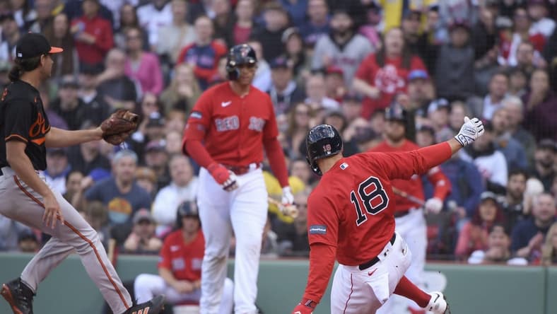 Apr 1, 2023; Boston, Massachusetts, USA; Boston Red Sox center fielder Adam Duvall (18) scores a run on a wild pitch during the second inning against the Baltimore Orioles at Fenway Park. Mandatory Credit: Bob DeChiara-USA TODAY Sports