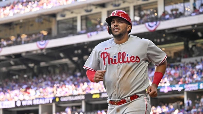 Apr 1, 2023; Arlington, Texas, USA; Philadelphia Phillies first baseman Darick Hall (24) runs off the field after scoring against the Texas Rangers during the fourth inning at Globe Life Field. Mandatory Credit: Jerome Miron-USA TODAY Sports