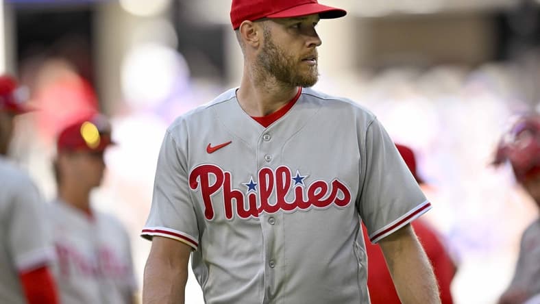 Apr 1, 2023; Arlington, Texas, USA; Philadelphia Phillies starting pitcher Zack Wheeler (45) leaves the game against the Texas Rangers during the fifth inning at Globe Life Field. Mandatory Credit: Jerome Miron-USA TODAY Sports