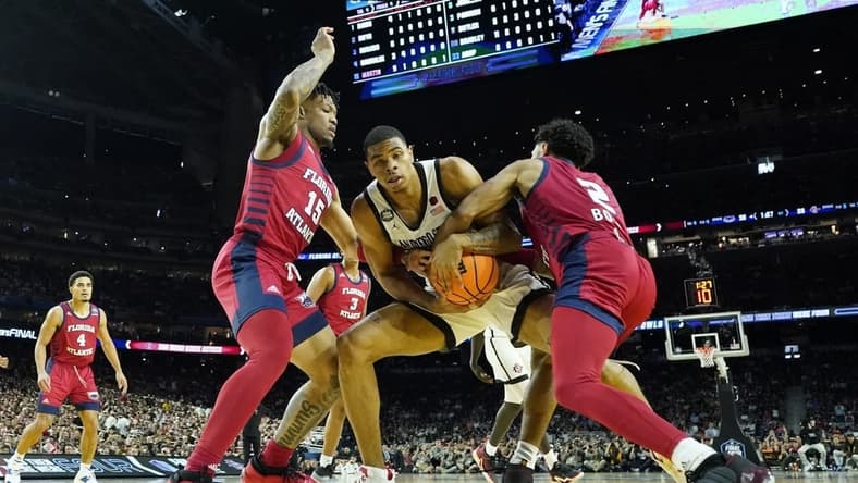 Apr 1, 2023; Houston, TX, USA; San Diego State Aztecs forward Keshad Johnson (0) battles for a rebound with Florida Atlantic Owls guard Alijah Martin (15) and Florida Atlantic Owls guard Nicholas Boyd (2) in the semifinals of the Final Four of the 2023 NCAA Tournament at NRG Stadium. Mandatory Credit: Robert Deutsch-USA TODAY Sports