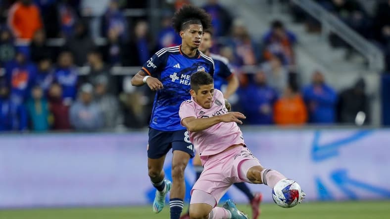 Apr 1, 2023; Cincinnati, Ohio, USA; Inter Miami CF forward Nicolas Stefanelli (22) controls the ball against FC Cincinnati midfielder Marco Angulo (8) in the first half at TQL Stadium. Mandatory Credit: Katie Stratman-USA TODAY Sports