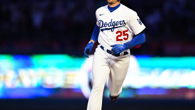 Apr 1, 2023; Los Angeles, California, USA; Los Angeles Dodgers center fielder Trayce Thompson (25) runs to home after hitting a home run against the Arizona Diamondbacks during the fifth inning at Dodger Stadium. Mandatory Credit: Jonathan Hui-USA TODAY Sports