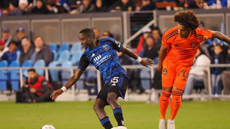 Apr 1, 2023; San Jose, California, USA; San Jose Earthquakes midfielder Jamiro Monteiro (35) controls the ball ahead of Houston Dynamo midfielder Adalberto Carrasquilla (20) during the first half at PayPal Park. Mandatory Credit: Kelley L Cox-USA TODAY Sports