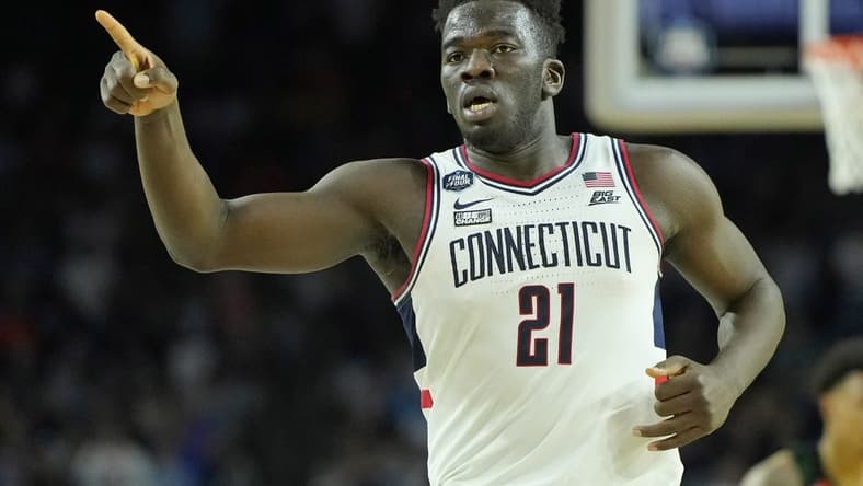 Apr 1, 2023; Houston, TX, USA; Connecticut Huskies forward Adama Sanogo (21) reacts after a play against the Miami (Fl) Hurricanes during the second half in the semifinals of the Final Four of the 2023 NCAA Tournament at NRG Stadium. Mandatory Credit: Bob Donnan-USA TODAY Sports