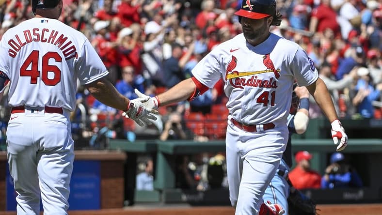 Apr 2, 2023; St. Louis, Missouri, USA;  St. Louis Cardinals left fielder Alec Burleson (41) celebrates with first baseman Paul Goldschmidt (46) after hitting a solo home run against the Toronto Blue Jays during the first inning at Busch Stadium. Mandatory Credit: Jeff Curry-USA TODAY Sports