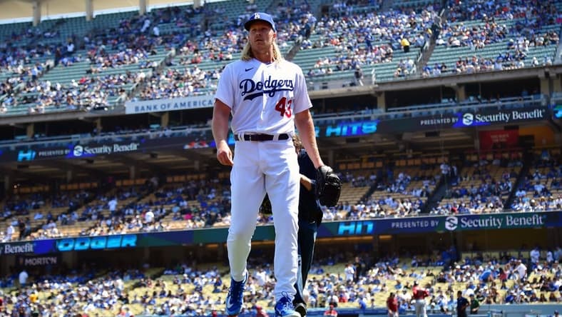 Apr 2, 2023; Los Angeles, California, USA; Los Angeles Dodgers starting pitcher Noah Syndergaard (43) returns to the dugout following the top of the first inning against the Arizona Diamondbacks at Dodger Stadium. Mandatory Credit: Gary A. Vasquez-USA TODAY Sports