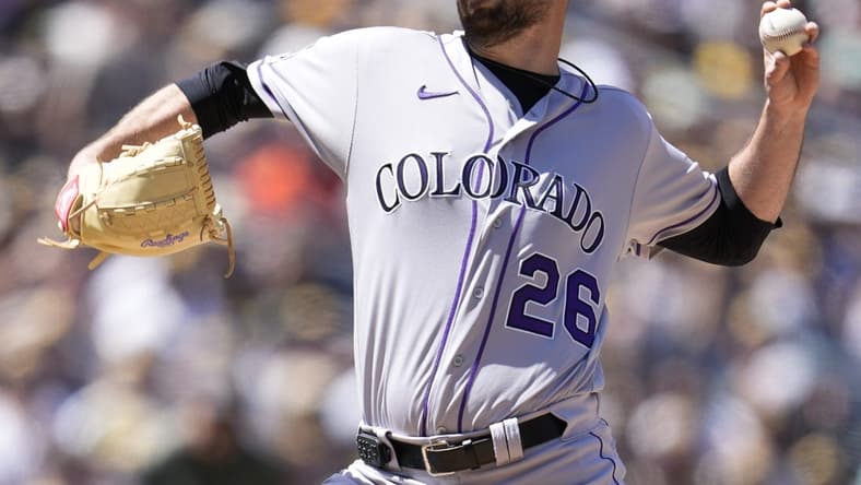 Apr 2, 2023; San Diego, California, USA;  Colorado Rockies starting pitcher Austin Gomber (26) throws a pitch against the San Diego Padres during the first inning at Petco Park. Mandatory Credit: Ray Acevedo-USA TODAY Sports