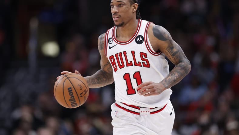 Apr 2, 2023; Chicago, Illinois, USA; Chicago Bulls forward DeMar DeRozan (11) brings the ball up court against the Memphis Grizzlies during the second half at United Center. Mandatory Credit: Kamil Krzaczynski-USA TODAY Sports