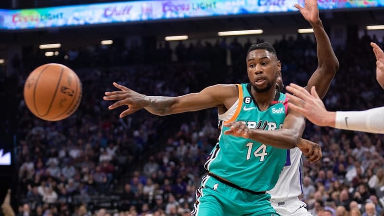 Apr 2, 2023; Sacramento, California, USA; San Antonio Spurs guard Blake Wesley (14) passes the ball during the first quarter against the Sacramento Kings at Golden 1 Center. Mandatory Credit: Ed Szczepanski-USA TODAY Sports