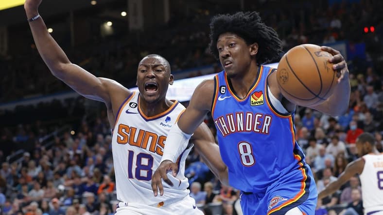 Apr 2, 2023; Oklahoma City, Oklahoma, USA; Oklahoma City Thunder forward Jalen Williams (8) drives to the basket against Phoenix Suns center Bismack Biyombo (18) during the second quarter at Paycom Center. Mandatory Credit: Alonzo Adams-USA TODAY Sports