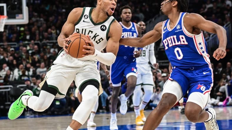 Apr 2, 2023; Milwaukee, Wisconsin, USA; Milwaukee Bucks forward Giannis Antetokounmpo (34) drives for the basket against Philadelphia 76ers guard Tyrese Maxey (0) in the first quarter at Fiserv Forum. Mandatory Credit: Benny Sieu-USA TODAY Sports