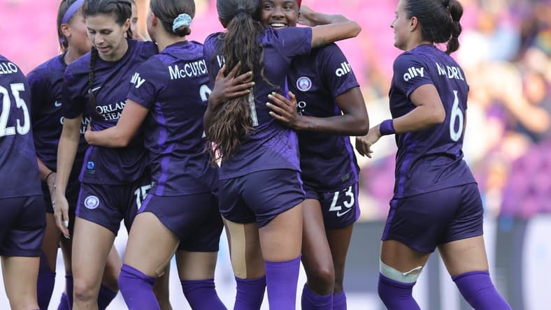 Apr 2, 2023; Orlando, Florida, USA; Orlando Pride forward Messiah Bright (23) celebrates a goal with teammates in the second half against Angel City FC at Exploria Stadium. Mandatory Credit: Cory Knowlton-USA TODAY Sports