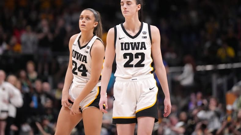 Apr 2, 2023; Dallas, TX, USA; Iowa Hawkeyes guard Gabbie Marshall (24) and guard Caitlin Clark (22) react during the NCAA Womens Basketball Final Four National Championship against the LSU Lady Tigers at American Airlines Center. Mandatory Credit: Kirby Lee-USA TODAY Sports