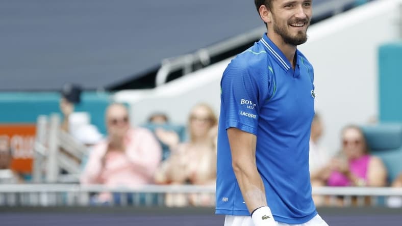 Apr 2, 2023; Miami, Florida, US; Daniil Medvedev smiles after match point against Jannik Sinner (ITA) (not pictured) in the men's singles final on day fourteen of the Miami Open at Hard Rock Stadium. Mandatory Credit: Geoff Burke-USA TODAY Sports
