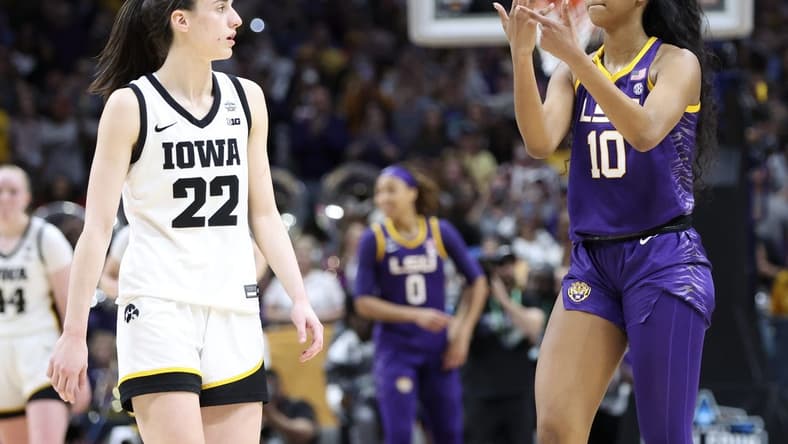 Apr 2, 2023; Dallas, TX, USA; LSU Lady Tigers forward Angel Reese (10) gestures to Iowa Hawkeyes guard Caitlin Clark (22) after the game during the final round of the Women's Final Four NCAA tournament at the American Airlines Center. Mandatory Credit: Kevin Jairaj-USA TODAY Sports