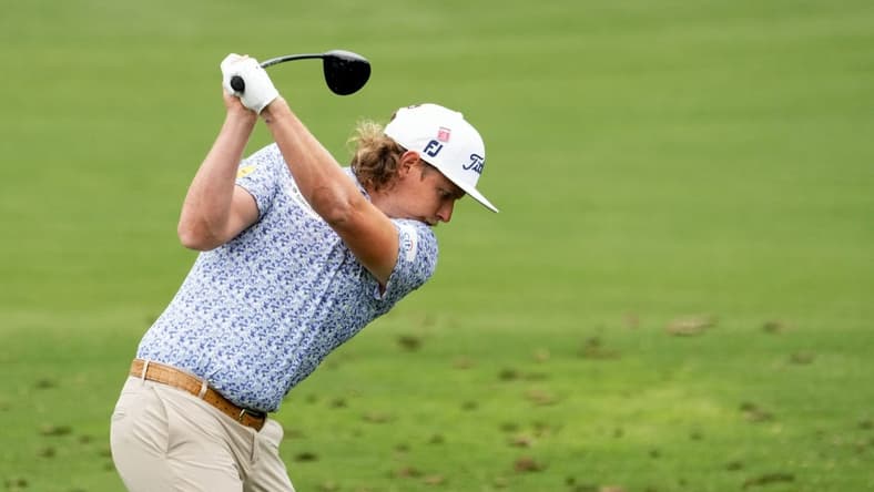 Apr 3, 2023; Augusta, Georgia, USA; Cameron Smith hits at the practice facility during a practice round for The Masters golf tournament at Augusta National Golf Club. Mandatory Credit: Rob Schumacher-USA TODAY Network