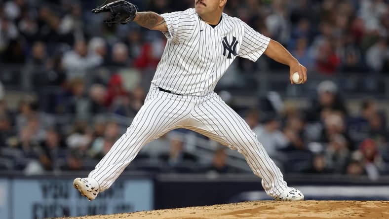 Apr 3, 2023; Bronx, New York, USA; New York Yankees starting pitcher Nestor Cortes (65) pitches against the Philadelphia Phillies during the second inning at Yankee Stadium. Mandatory Credit: Brad Penner-USA TODAY Sports
