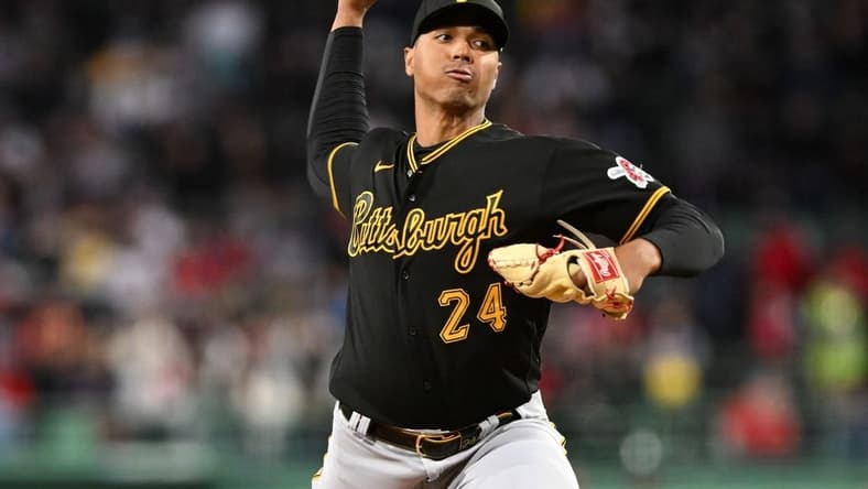 Apr 3, 2023; Boston, Massachusetts, USA; Pittsburgh Pirates relief pitcher Johan Oviedo (24) pitches against the Boston Red Sox during the first inning at Fenway Park. Mandatory Credit: Brian Fluharty-USA TODAY Sports