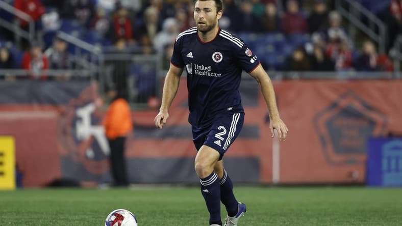 Apr 1, 2023; Foxborough, Massachusetts, USA; New England Revolution defender Dave Romney (2) against New York City FC during the first half at Gillette Stadium. Mandatory Credit: Winslow Townson-USA TODAY Sports