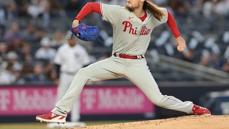 Apr 4, 2023; Bronx, New York, USA; Philadelphia Phillies relief pitcher Matt Strahm (25) delivers a pitch during the first inning against the New York Yankees at Yankee Stadium. Mandatory Credit: Vincent Carchietta-USA TODAY Sports