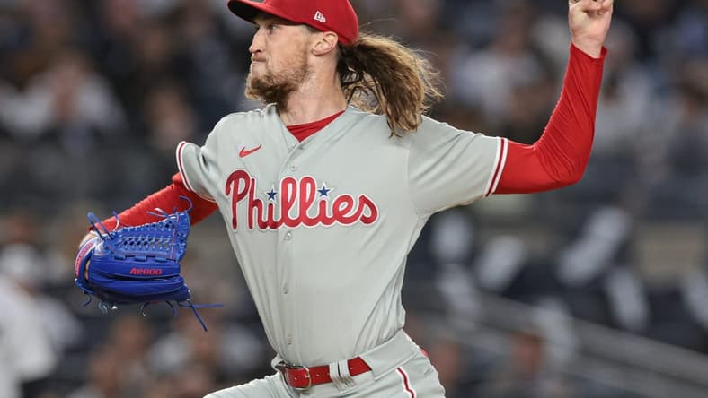 Apr 4, 2023; Bronx, New York, USA; Philadelphia Phillies relief pitcher Matt Strahm (25) delivers a pitch during the second inning against the New York Yankees at Yankee Stadium. Mandatory Credit: Vincent Carchietta-USA TODAY Sports