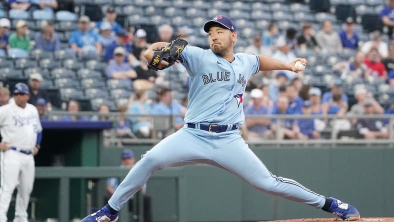 Apr 4, 2023; Kansas City, Missouri, USA; Toronto Blue Jays starting pitcher Yusei Kikuchi (16) delivers a pitch against the Kansas City Royals during the first inning at Kauffman Stadium. Mandatory Credit: Denny Medley-USA TODAY Sports