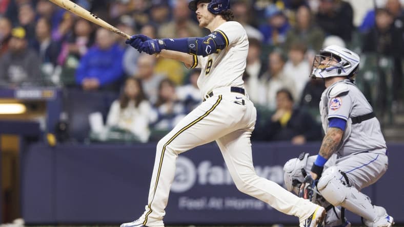 Apr 4, 2023; Milwaukee, Wisconsin, USA;  Milwaukee Brewers third baseman Brian Anderson (9) hits a home run during the sixth inning against the New York Mets at American Family Field. Mandatory Credit: Jeff Hanisch-USA TODAY Sports
