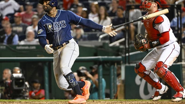 Apr 4, 2023; Washington, District of Columbia, USA; Tampa Bay Rays first baseman Yandy Diaz (2) hits a three run home run against the Washington Nationals during the ninth inning at Nationals Park. Mandatory Credit: Brad Mills-USA TODAY Sports