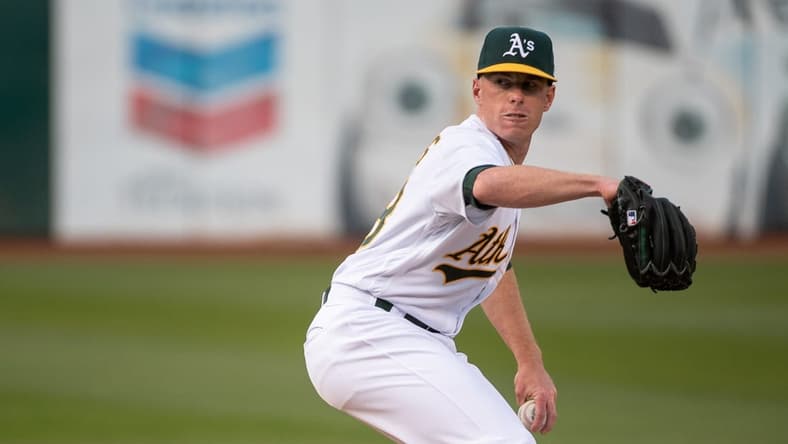 Apr 4, 2023; Oakland, California, USA; Oakland Athletics starting pitcher JP Sears (38) throws a pitch during the first inning against the Cleveland Guardians at RingCentral Coliseum. Mandatory Credit: Ed Szczepanski-USA TODAY Sports