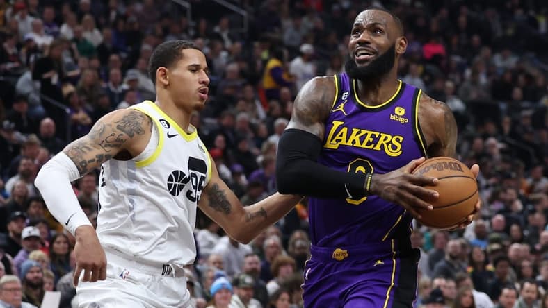 Apr 4, 2023; Salt Lake City, Utah, USA; Los Angeles Lakers forward LeBron James (6) drives against Utah Jazz forward Juan Toscano-Anderson (95) in the second quarter at Vivint Arena. Mandatory Credit: Rob Gray-USA TODAY Sports