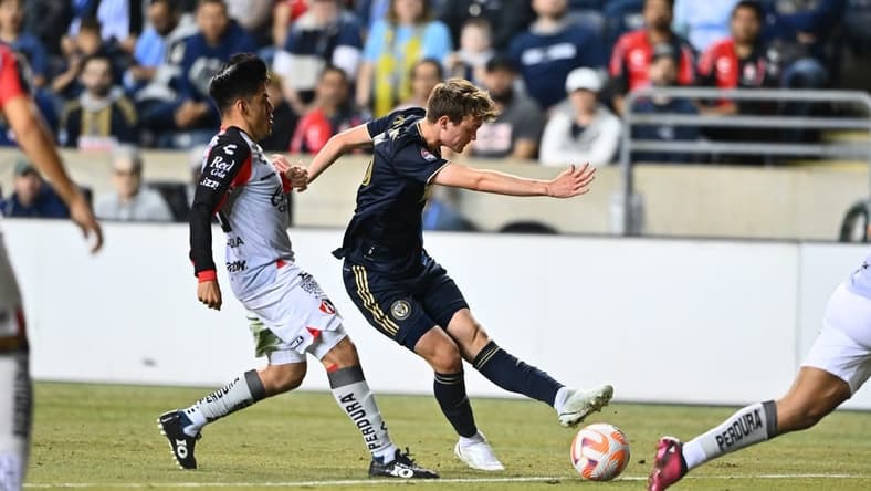Apr 4, 2023; Chester, PA, USA; Philadelphia Union midfielder Jack McGlynn (16) passes the ball against Atlas FC in the first half at Subaru Park. Mandatory Credit: Kyle Ross-USA TODAY Sports