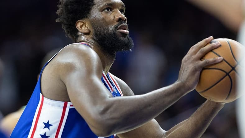 Apr 4, 2023; Philadelphia, Pennsylvania, USA; Philadelphia 76ers center Joel Embiid (21) shoots a foul shot against the Boston Celtics during the third quarter at Wells Fargo Center. Mandatory Credit: Bill Streicher-USA TODAY Sports