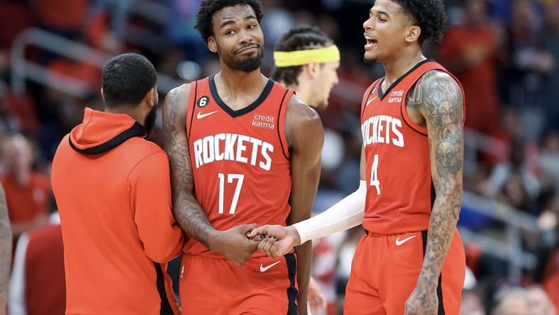 Apr 4, 2023; Houston, Texas, USA; Houston Rockets forward Tari Eason (17) and guard Jalen Green (4) celebrate after a play during the fourth quarter against the Denver Nuggets at Toyota Center. Mandatory Credit: Troy Taormina-USA TODAY Sports