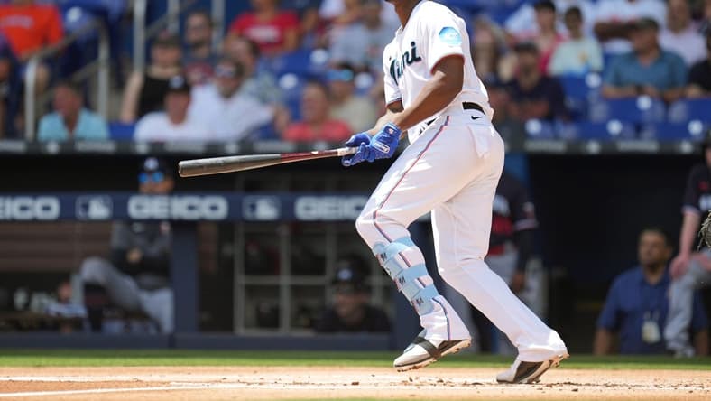 Apr 5, 2023; Miami, Florida, USA;  Miami Marlins left fielder Jorge Soler (12) hits a home run against the Minnesota Twins in the first inning at loanDepot Park. Mandatory Credit: Jim Rassol-USA TODAY Sports