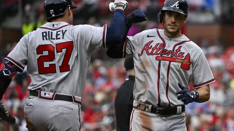 Apr 5, 2023; St. Louis, Missouri, USA;  Atlanta Braves first baseman Matt Olson (28) celebrates with third baseman Austin Riley (27) after hitting a solo home run against the St. Louis Cardinals during the second inning at Busch Stadium. Mandatory Credit: Jeff Curry-USA TODAY Sports