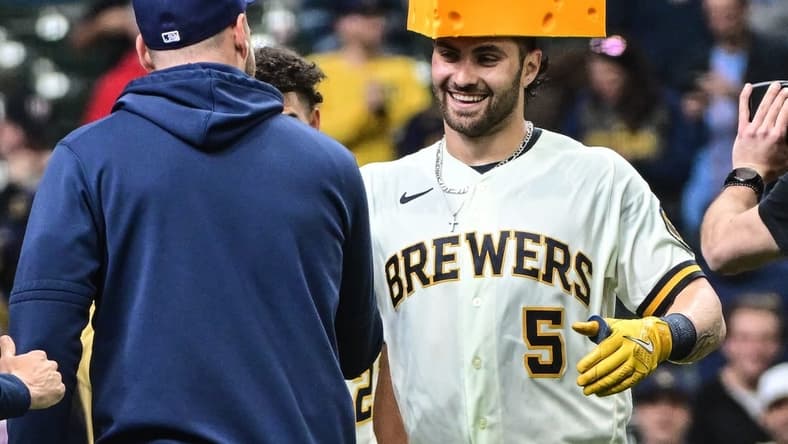Apr 5, 2023; Milwaukee, Wisconsin, USA;  Milwaukee Brewers left fielder Garrett Mitchell (5) celebrates after hitting a walkout home run in the ninth inning against the New York Mets at American Family Field. Mandatory Credit: Benny Sieu-USA TODAY Sports