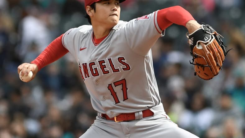 Apr 5, 2023; Seattle, Washington, USA; Los Angeles Angels starting pitcher Shohei Ohtani (17) throws a pitch against the Seattle Mariners during the third inning at T-Mobile Park. Mandatory Credit: Michael Thomas Shroyer-USA TODAY Sports