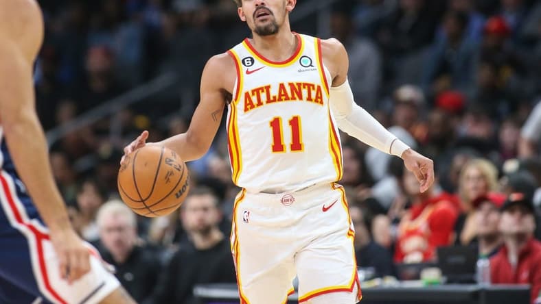 Apr 5, 2023; Atlanta, Georgia, USA; Atlanta Hawks guard Trae Young (11) dribbles against the Washington Wizards in the first half at State Farm Arena. Mandatory Credit: Brett Davis-USA TODAY Sports