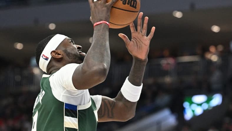 Apr 5, 2023; Milwaukee, Wisconsin, USA; Milwaukee Bucks forward Bobby Portis (9) puts up a shot against the Chicago Bulls in the second half at Fiserv Forum. Mandatory Credit: Michael McLoone-USA TODAY Sports