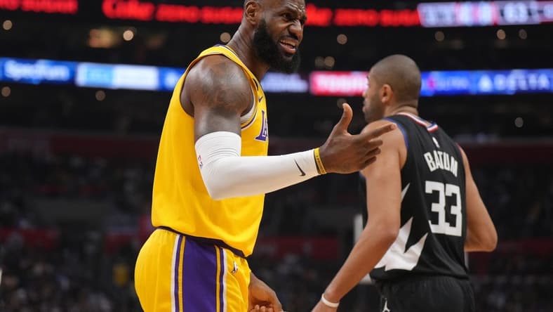 Apr 5, 2023; Los Angeles, California, USA; Los Angeles Lakers forward LeBron James (6) reacts against the LA Clippers in the first half at Crypto.com Arena. Mandatory Credit: Kirby Lee-USA TODAY Sports