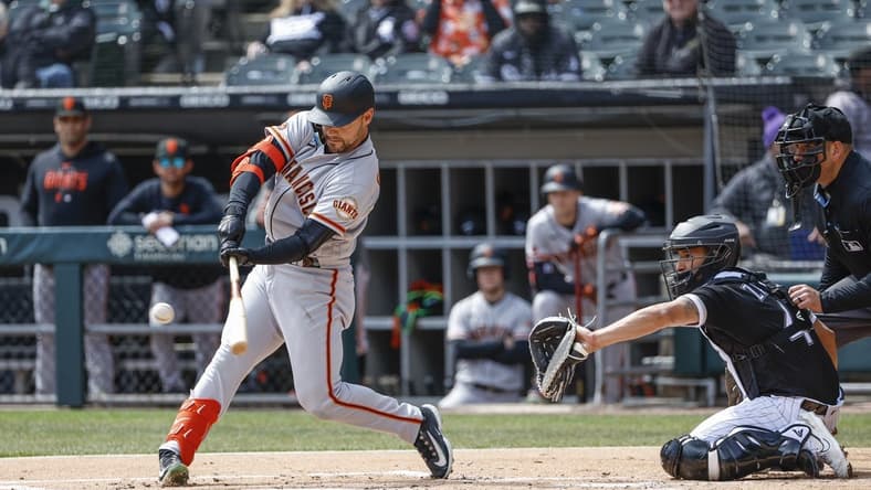 Apr 6, 2023; Chicago, Illinois, USA; San Francisco Giants right fielder Michael Conforto (8) hits a three-run home run against the Chicago White Sox during the first inning at Guaranteed Rate Field. Mandatory Credit: Kamil Krzaczynski-USA TODAY Sports
