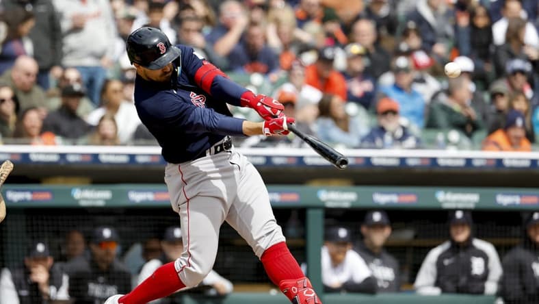Apr 6, 2023; Detroit, Michigan, USA; Boston Red Sox center fielder Adam Duvall (18) hits a three run home run in the sixth inning against the Detroit Tigers at Comerica Park. Mandatory Credit: Rick Osentoski-USA TODAY Sports