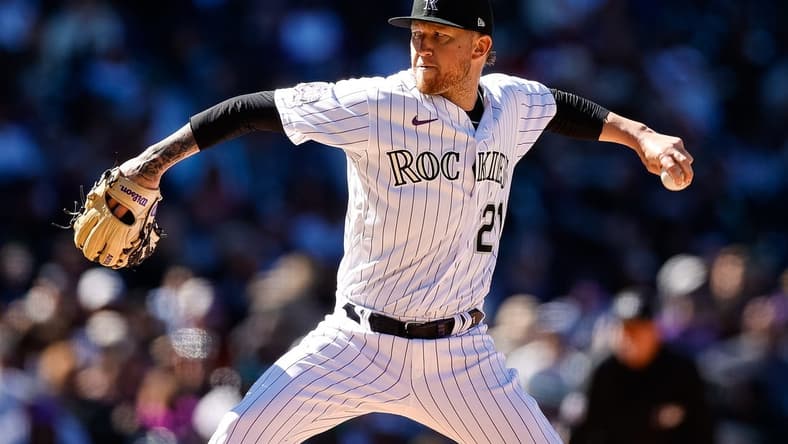 Apr 6, 2023; Denver, Colorado, USA; Colorado Rockies starting pitcher Kyle Freeland (21) pitches in the fifth inning against the Washington Nationals at Coors Field. Mandatory Credit: Isaiah J. Downing-USA TODAY Sports