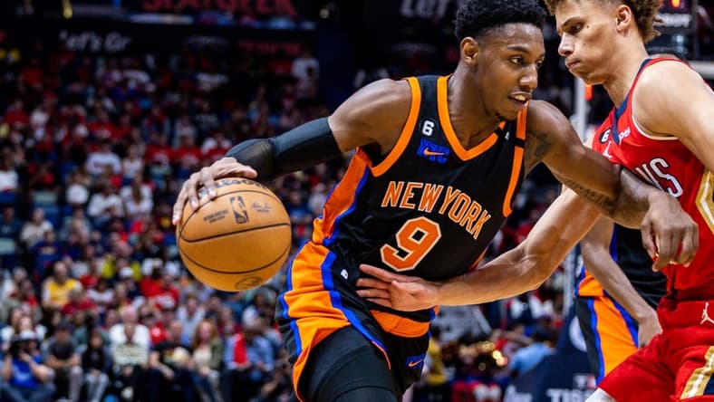 Apr 7, 2023; New Orleans, Louisiana, USA;  New York Knicks guard RJ Barrett (9) dribbles against New Orleans Pelicans guard Dyson Daniels (11) during the first half at Smoothie King Center. Mandatory Credit: Stephen Lew-USA TODAY Sports
