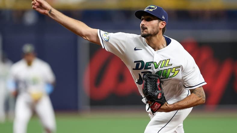 Apr 7, 2023; St. Petersburg, Florida, USA;  Tampa Bay Rays starting pitcher Zach Eflin (24) throws a pitch against the Oakland Athletics in the fourth inning at Tropicana Field. Mandatory Credit: Nathan Ray Seebeck-USA TODAY Sports