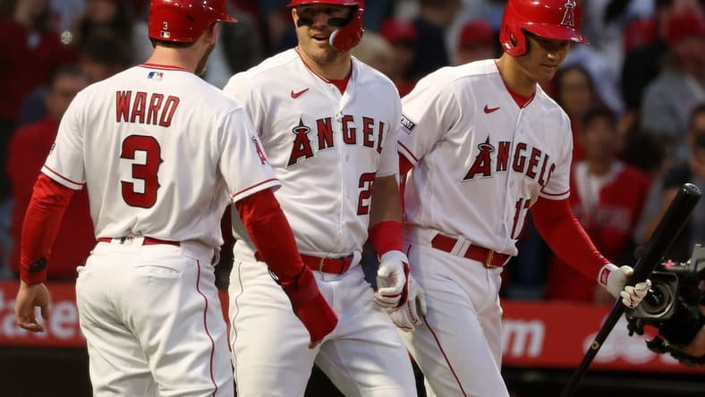Apr 7, 2023; Anaheim, California, USA;  Los Angeles Angels center fielder Mike Trout (27) is greeted by left fielder Taylor Ward (3) and designated hitter Shohei Ohtani (17) after hitting a two run home run during the first inning against the Toronto Blue Jays at Angel Stadium. Mandatory Credit: Kiyoshi Mio-USA TODAY Sports