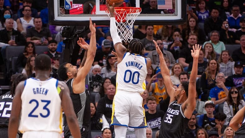 Apr 7, 2023; Sacramento, California, USA; Golden State Warriors forward Jonathan Kuminga (00) puts up a shot during the second quarter against the Sacramento Kings at Golden 1 Center. Mandatory Credit: Ed Szczepanski-USA TODAY Sports