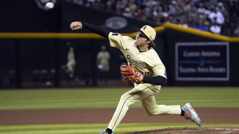 Apr 7, 2023; Phoenix, Arizona, USA; Arizona Diamondbacks relief pitcher Drey Jameson (99) throws against the Los Angeles Dodgers in the sixth inning at Chase Field. Mandatory Credit: Rick Scuteri-USA TODAY Sports